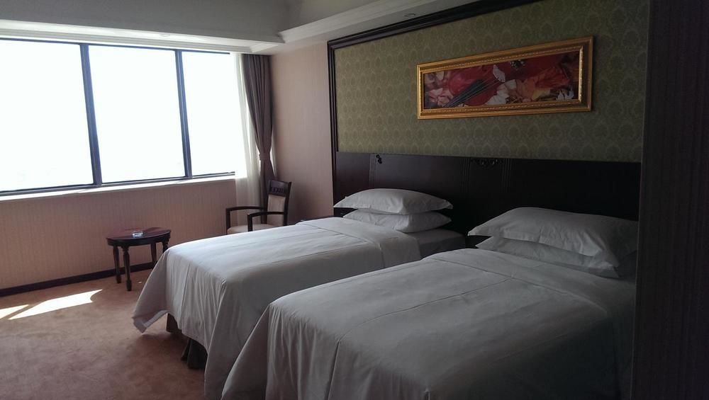 שנגחאי Vienna Hotel Sh Fengxian Nanqiao Jinhai Road מראה חיצוני תמונה